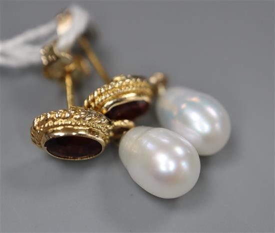 A pair of mid to late 20th century 9ct gold, garnet and freshwater pearl set drop earrings, 21mm, gross 3 grams.